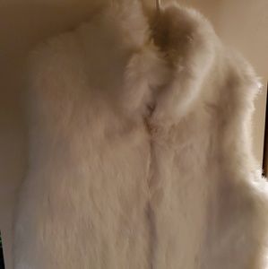 White fur vest